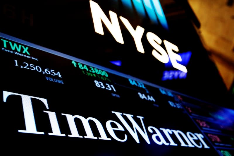 Ticker and trading information for media conglomerate Time Warner Inc. is displayed at the post where it is traded on the floor of the New York Stock Exchange (NYSE) in New York City, U.S., October 21, 2016. REUTERS/Brendan McDermid