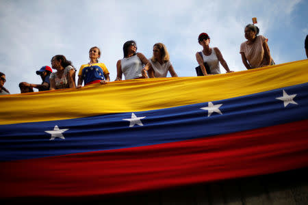 Opposition supporters attend a rally to pay tribute to victims of violence during protests against Venezuelan President Nicolas Maduro's government in Caracas, Venezuela, July 24, 2017. REUTERS/Andres Martinez Casares