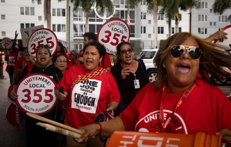 Sky Chefs MIami union food workers Bianca Wolf, left, and Niunka Bena, right, want better pay, so they participated in a demonstration Wednesday, Oct. 11, 2023.