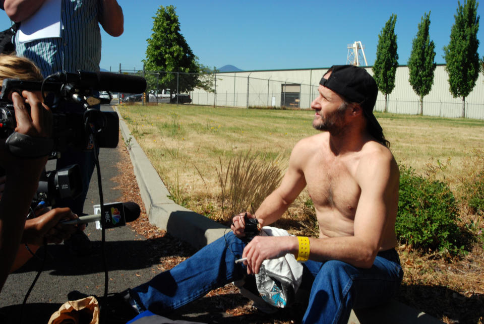 William Nathan Smith of San Jose, Calif., talks to reporters Wednesday, May 30, 2012 after being released early from the Josephine County Jail in Grants Pass, Ore. He was among 39 released all at once due to layoffs of guards forced by the failure of a tax increase. Smith said he served 30 days of a 50-day sentence for drugs, a minor assault and being a felon in possession of a firearm and will finish his sentence on a work crew. He said he plans to ``get a job and do the right thing'' now that he is out. (AP Photo/Jeff Barnard)