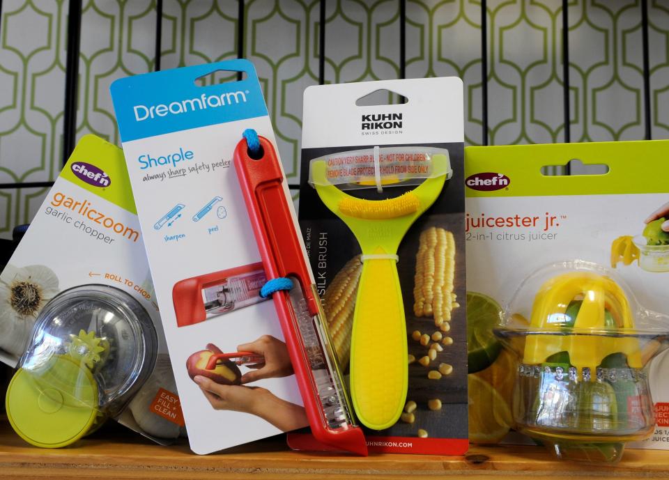 Cool kitchen gifts from Thyme in the Kitchen, from left: Garlic Zoom, Sharple peeler, Corn Zipper with brush, and  Juicester Jr. lemon and lime juicer.