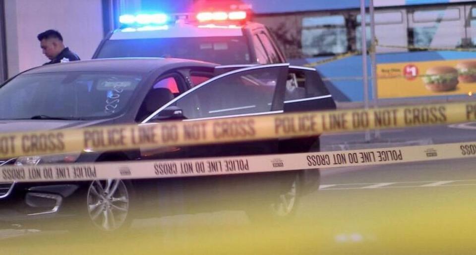 A car possibly involved in a shooting at Shaw and Brawley avenues was surrounded by crime tape on Monday, July 31, 2023.