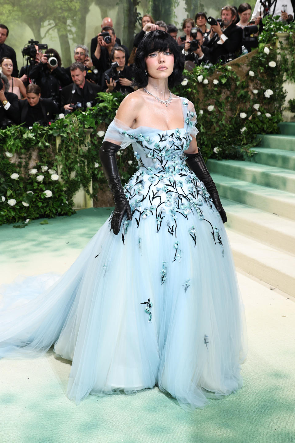 Sydney Sweeney in baby blue floral gown by Miu Miu. (Image via Getty Images)