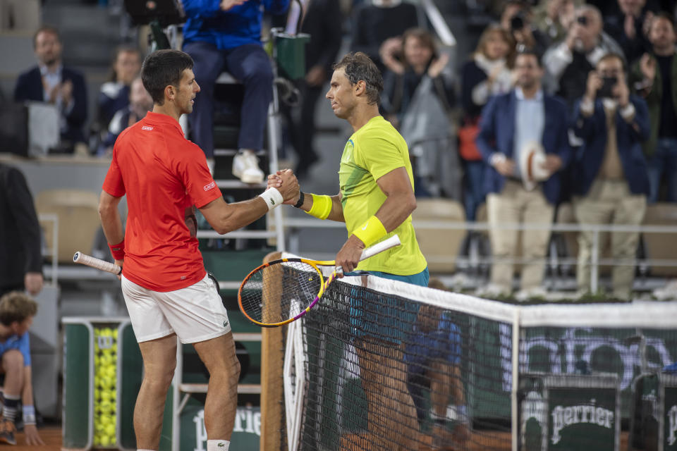 PARIS, FRANCE May 31. Winner Rafael Nadal of Spain is congratulated at the net by Novak Djokovic of Serbia on Court Philippe Chatrier during the singles Quarter Final match at the 2022 French Open Tennis Tournament at Roland Garros on May 31st 2022 in Paris, France. (Photo by Tim Clayton/Corbis via Getty Images)
