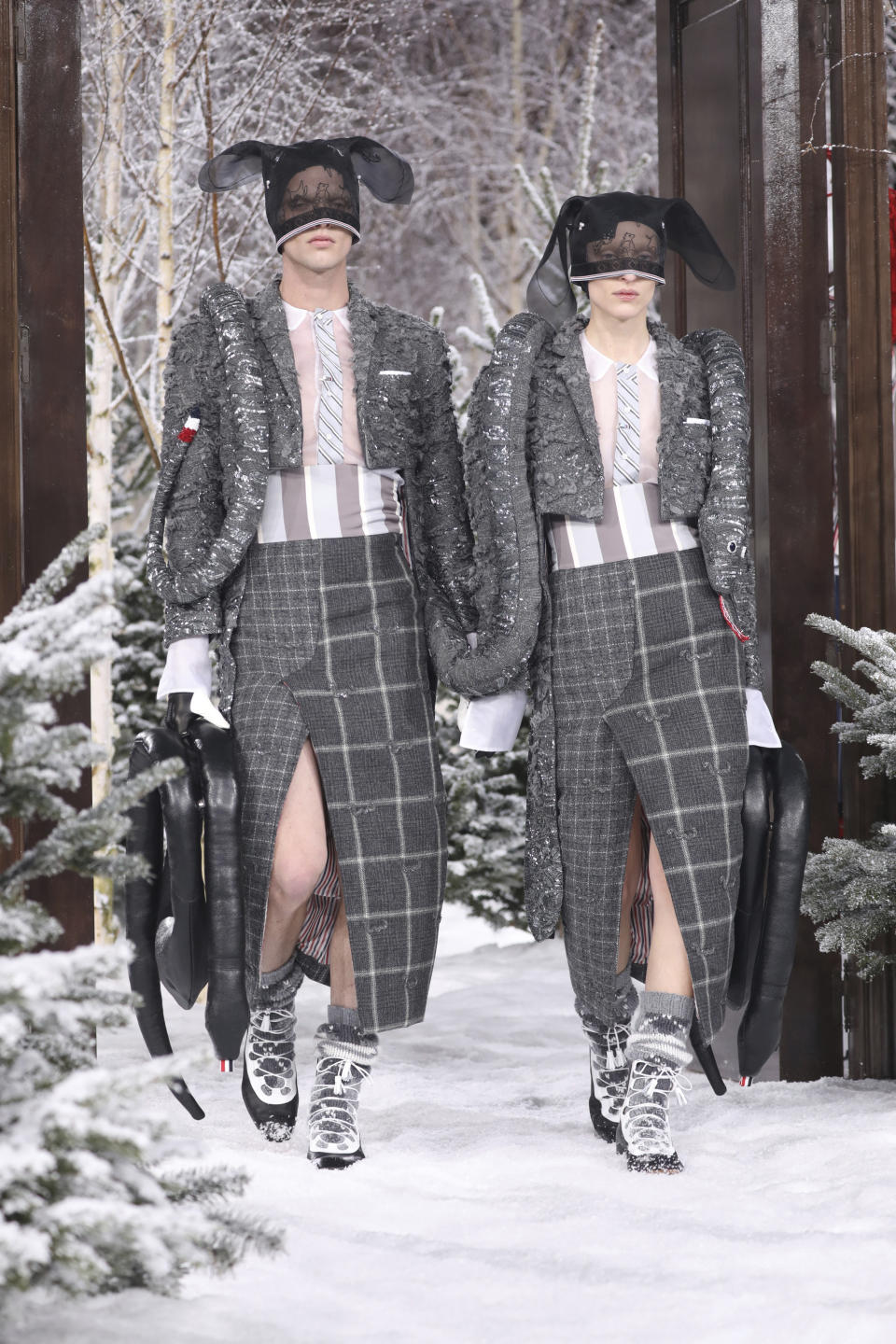 Models wear creations for the Thom Browne fashion collection during Women's fashion week Fall/Winter 2020/21 presented in Paris, Sunday, March 1, 2020. (Photo by Vianney Le Caer/Invision/AP)