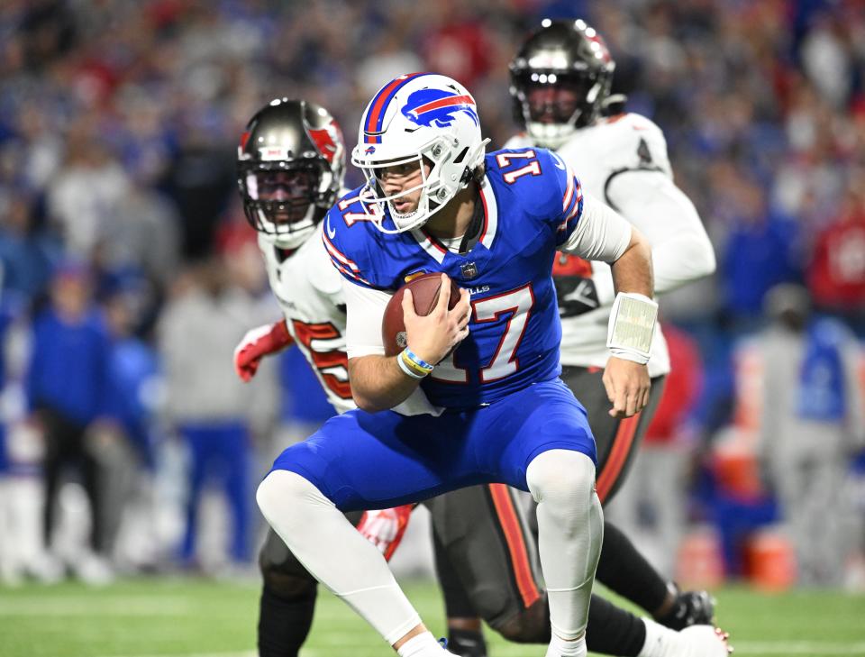 Buffalo Bills quarterback Josh Allen (17) runs the ball against the Tampa Bay Buccaneers.