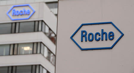 FILE PHOTO: The logo of Swiss drugmaker Roche is seen at its headquarters in Basel, Switzerland February 1, 2018. REUTERS/Arnd Wiegmann/File Photo