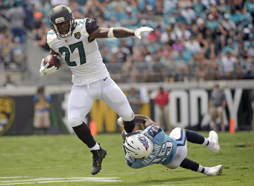 The show went on for Leonard Fournette and the Jaguars on Sunday, a blowout loss to the Titans. (AP) 