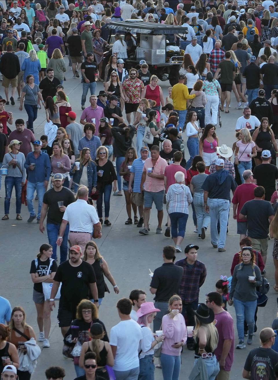 Large crowds make their way along Grand Avenue during the Iowa State Fair in 2022.