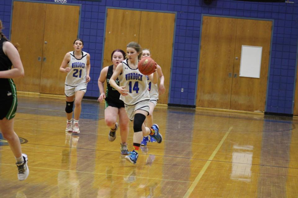 Murdock's Sadie Bauver drives down the court in a game against Parker Charter on February 5, 2024.