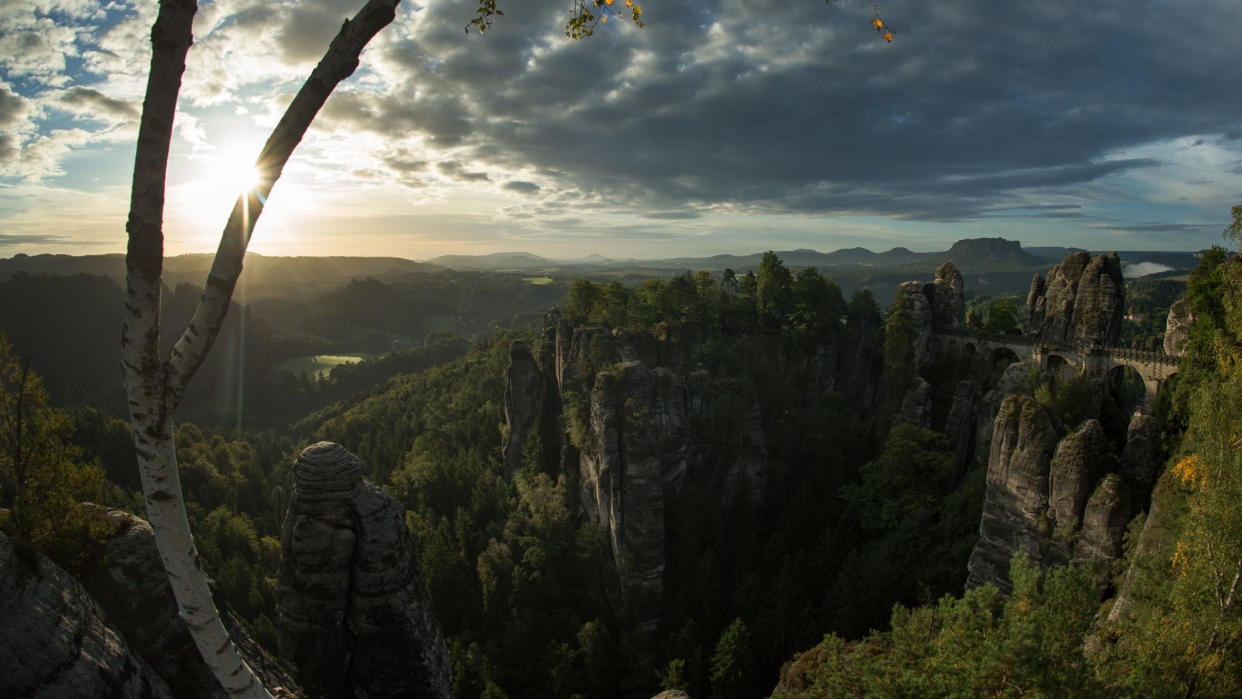  View of the Basteibruecke (Bastei bridge) and the landscape of the Saechsische Schweiz (Saxon Switzerland) region in the Elbe Sandstone Mountains. 