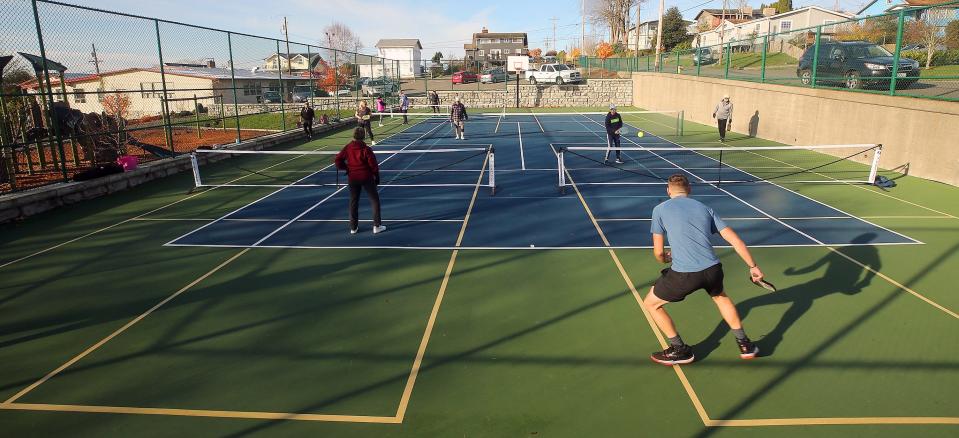 FILE — People play pickleball on the courts in Manette in November 2021.