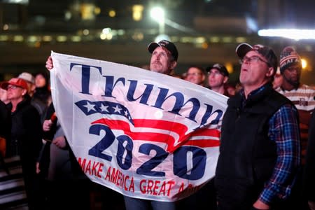 FILE PHOTO: Supporters watch rally by U.S. President Donald Trump from the outside in Minneapolis, Minnesota