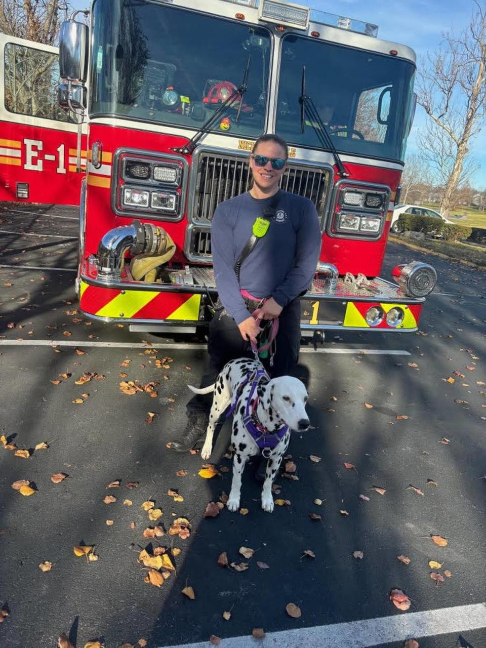 Nicholasville firefighters with their Dalmatian mascot, Ashes.