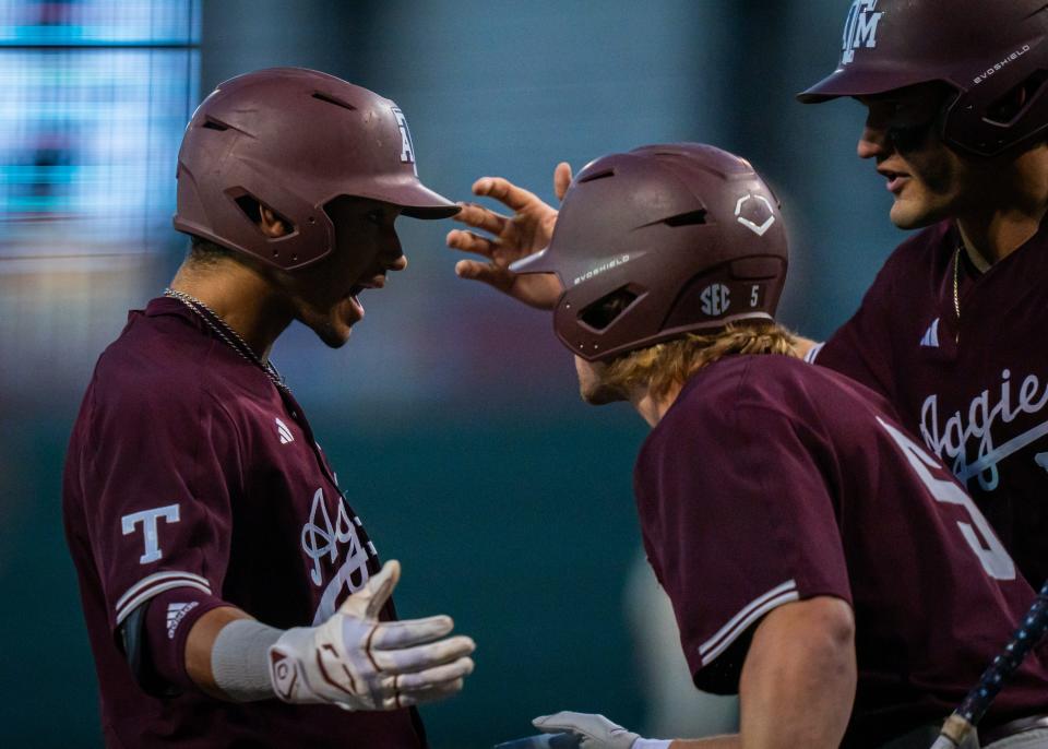 Texas A&M outfielder Braden Montgomery (6) celebrates a home run with his teammates in the first inning of the Longhorns' game against the Texas A&M Aggies at the UFCU Disch-Falk Field in Austin, Tuesday, March 5, 2024.