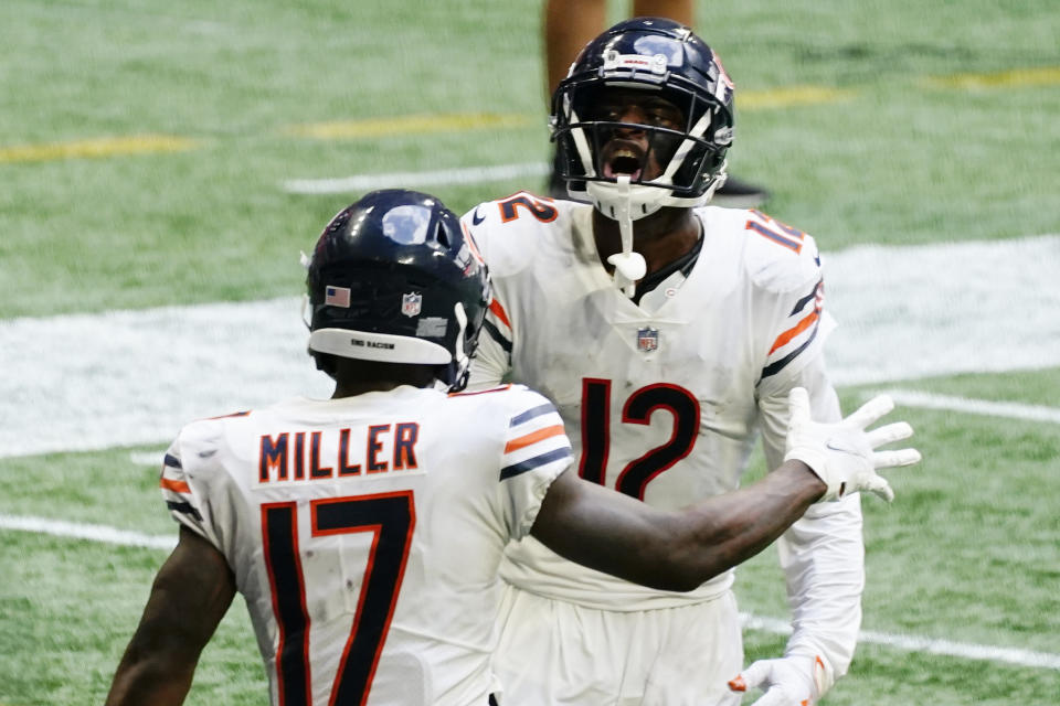 Chicago Bears wide receiver Anthony Miller (17) celebrates his touchdown with Chicago Bears wide receiver Allen Robinson (12) against the Atlanta Falcons during the second half of an NFL football game, Sunday, Sept. 27, 2020, in Atlanta. (AP Photo/Brynn Anderson)