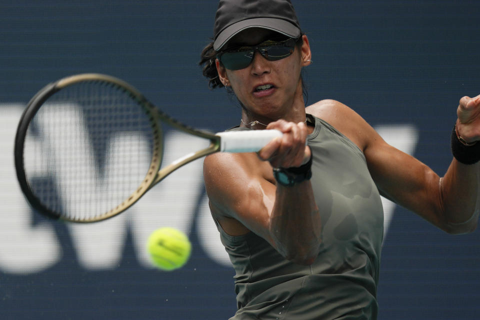 Astra Sharma of Australia returns a ball in her first round women's match against Naomi Osaka of Japan, at the Miami Open tennis tournament, Wednesday, March 23, 2022, in Miami Gardens, Fla. (AP Photo/Rebecca Blackwell)
