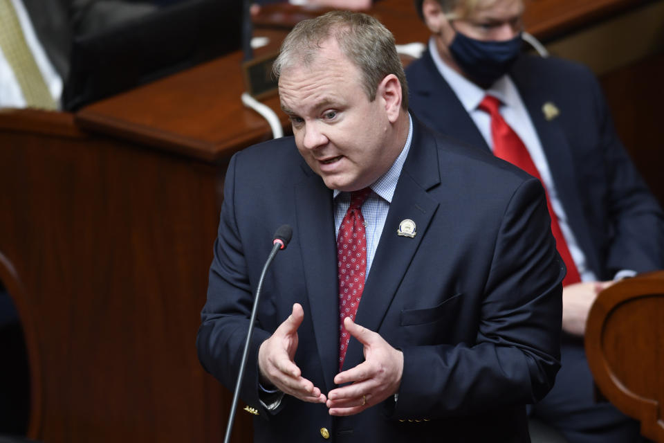 Kentucky House Rep. Jason Nemes responds to a question in reference to Ky. Senate Bill 4, an act relating to warrants authorizing entry without notice during the last day of the legislature at the Kentucky State Capitol in Frankfort, Ky., Tuesday, March 30, 2021. (AP Photo/Timothy D. Easley)