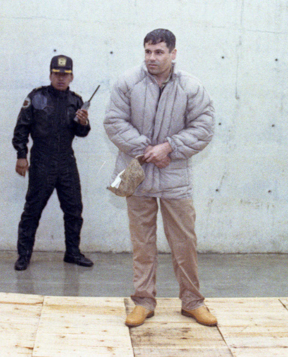 FILE - In this June 10, 1993 file photo, Mexican drug lord Joaquin "El Chapo" Guzman is shown to the press at the Almoloya de Juarez, a high security prison on the outskirts of Mexico City. A senior U.S. law enforcement official said Saturday, Feb. 22, 2014 that Guzman, the head of Mexico’s Sinaloa Cartel, was captured alive overnight in the beach resort town of Mazatlan. Guzman faces multiple federal drug trafficking indictments in the U.S. and is on the Drug Enforcement Administration’s most-wanted list. (AP Photo/Damian Dovarganes, File)