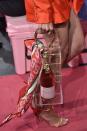 <p>Last but not least, this bag definitely falls into the category of Crazy Genius. For his Spring 2019 collection, Brandon Maxwell sent clear box bags filled with rosé bottles down the runway. A handbag meant specifically for carrying bottles of champagne and rosé is exactly what we need to carry out of 2018.</p>