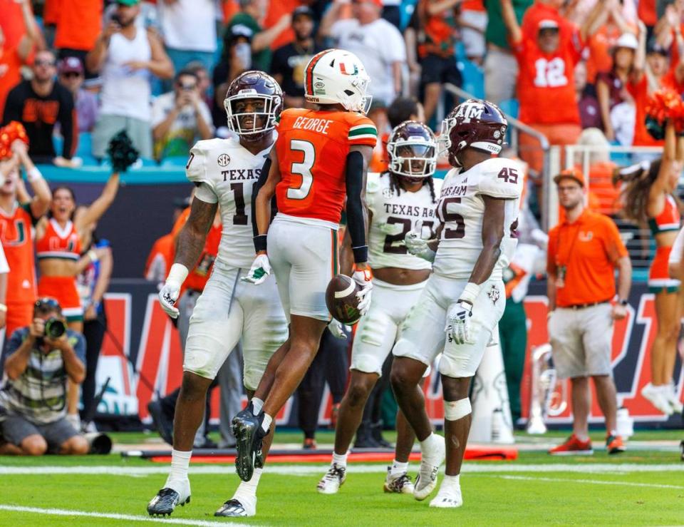 Miami Hurricanes wide receiver Jacolby George (3) celebrates after scores a touchdown against Texas A&M during the second quarter of an NCAA non conference game at Hard Rock Stadium on Saturday, Sept. 9, 2023 in Miami Gardens, Florida.
