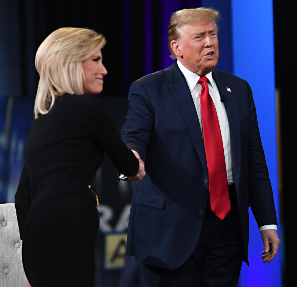 Donald Trump brought his returning bid for the White House to Greenville, S.C. The former President was in town for a Ingraham Angle Town Hall at the Greenville Convention Center on Tuesday, Feb. 20, 2024. Host Laura Ingraham greets Trump as he arrives to the stage.