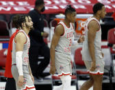 Ohio State guard Duane Washington, left, guard Eugene Brown, and forward Zed Key leave the bench following an NCAA college basketball game loss to Purdue in Columbus, Ohio, Tuesday, Jan. 19, 2021. (AP Photo/Paul Vernon)