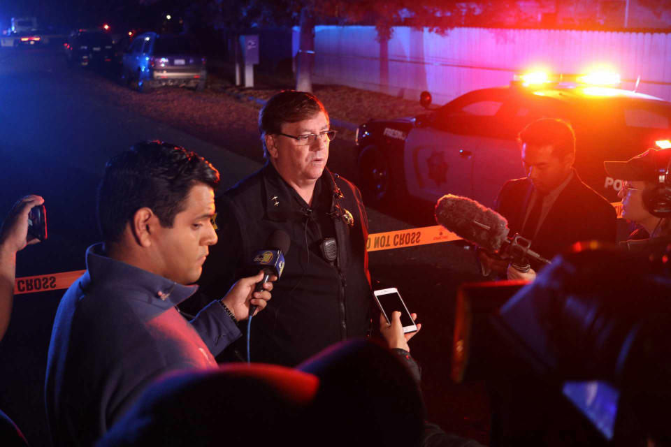 Fresno Police Lt. Bill Dooley speaks to reporters at the scene of a shooting at a backyard party Sunday, Nov. 17, 2019, in southeast Fresno, Calif. (Photo: Larry Valenzuela/The Fresno Bee via AP)