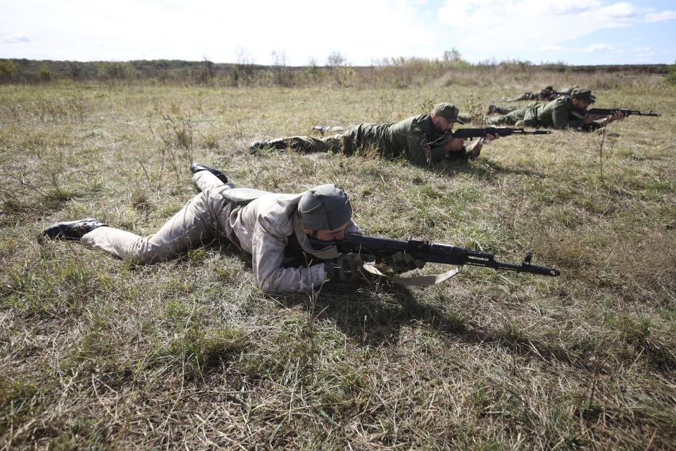 Recruits attend military training at a firing range in the Krasnodar region in southern Russia, Tuesday, Oct. 4, 2022. Russian Defense Minister Sergei said that the military has recruited over 200,000 reservists as part of a partial mobilization launched two weeks ago. (AP Photo)