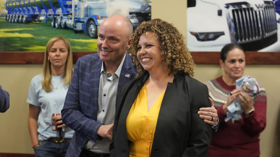 Utah 2nd Congressional District Republican Celeste Maloy receives a hug from Utah Gov. Spencer Cox after winning a Utah special election to replace her former boss U.S. Rep. Chris Stewart during an election night party, Tuesday, Nov. 21, 2023, in West Valley City, Utah. (AP Photo/Rick Bowmer)