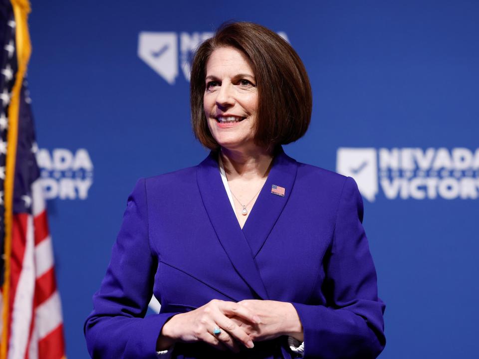 LAS VEGAS, NEVADA - NOVEMBER 08: U.S. Sen. Catherine Cortez Masto (D-NV) listens as Nevada Gov. Steve Sisolak delivers remarks at an election night party hosted by Nevada Democratic Victory at The Encore on November 08, 2022 in Las Vegas, Nevada. Sen. Catherine Cortez Masto (D-NV) is facing Republican challenger Adam Laxalt, while Gov. Steve Sisolak is facing Republican Joe Lombardo. (Photo by Anna Moneymaker/Getty Images)