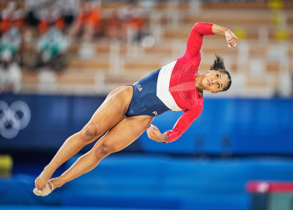 Jordan Chiles flies in the air diagonally during the artistic gymnastics final