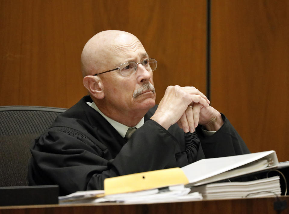 Judge Larry P. Fidler presides as Michael Gargiulo, not shown, listens as his guilty verdicts on all counts are read in Los Angeles Superior Court Thursday, Aug. 15, 2019. Gargiulo was charged with the murder of 22-year-old Ashley Ellerin in her Hollywood home in 2001 — on a night when she was supposed to have drinks with Ashton Kutcher, who testified at the trial. (Al Seib/Los Angeles Times via AP, Pool)