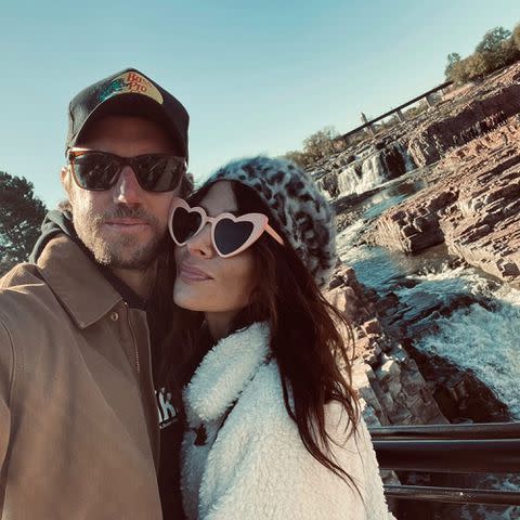 <p>Adam Demos Instagram</p> Adam Demos and Sarah Shahi take a selfie.