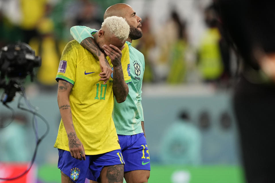 Brazil's Neymar reacts after the penalty shootout besides Brazil's goalkeeper Ederson at the World Cup quarterfinal soccer match between Croatia and Brazil, at the Education City Stadium in Al Rayyan, Qatar, Friday, Dec. 9, 2022. (AP Photo/Martin Meissner)