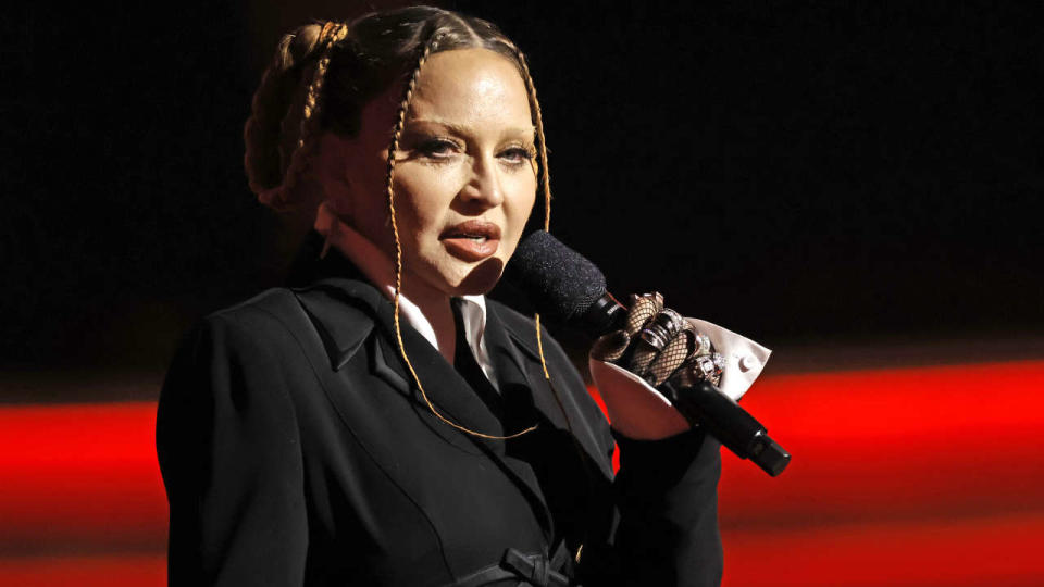 LOS ANGELES, CALIFORNIA - FEBRUARY 05: Madonna speaks onstage during the 65th GRAMMY Awards at Crypto.com Arena on February 05, 2023 in Los Angeles, California. (Photo by Kevin Winter/Getty Images for The Recording Academy )