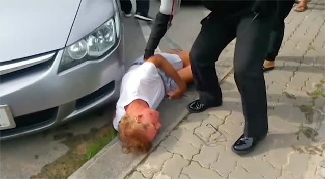 He fell to the ground after being punched. Source: Newsflare