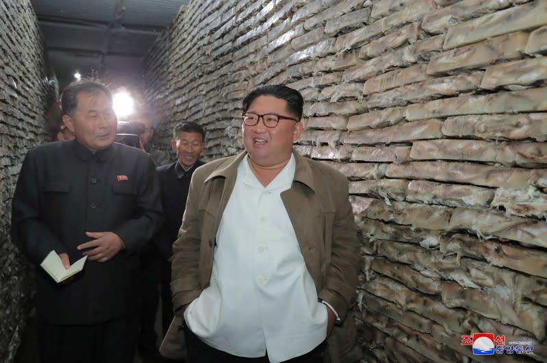 North Korean leader Kim Jong Un visits a fish processing facility in North Korea