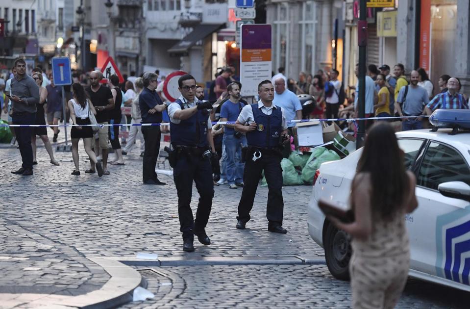 <p>Belgian police evacuate people near the Grand Place near Central Station in Brussels after a reported explosion on Tuesday, June 20, 2017. Belgian media are reporting that explosion-like noises have been heard at a Brussels train station, prompting the evacuation of a main square. (AP Photo/Geert Vanden Wijngaert) </p>