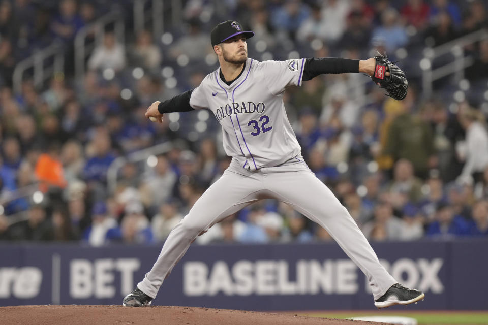 Colorado Rockies pitcher Dakota Hudson works against Toronto Blue Jays during the first inning of a baseball game in Toronto, Saturday, April 13, 2024. (Chris Young/The Canadian Press via AP)