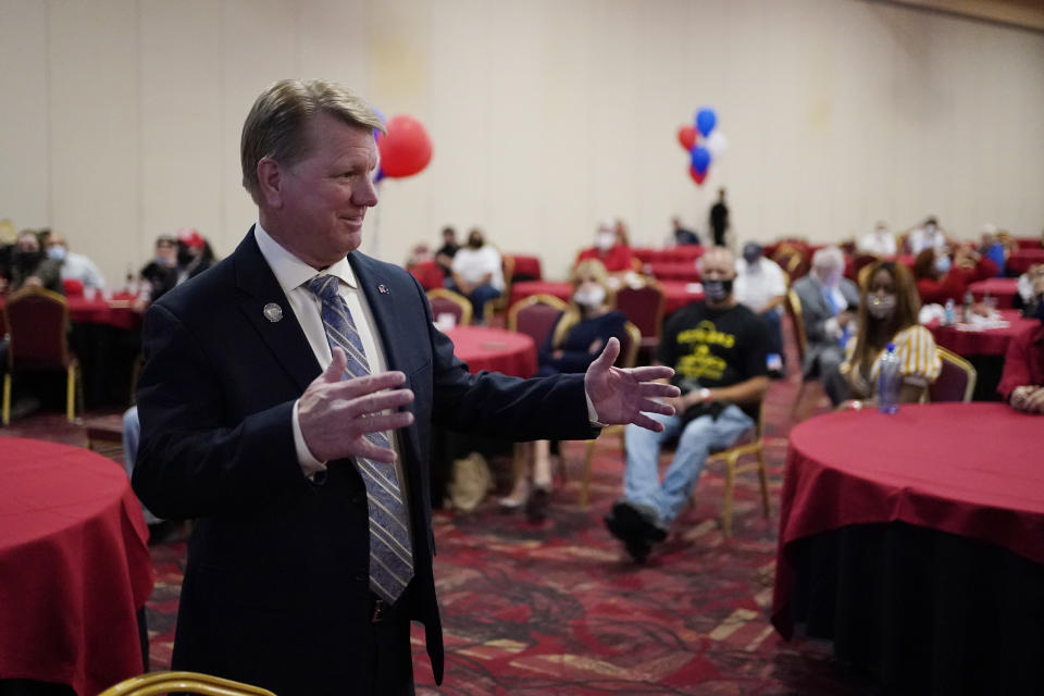 FILE - Jim Marchant meets with people at a Republican election night watch party, Tuesday, Nov. 3, 2020, in Las Vegas. Add one more contest to the white-hot races for Congress and governor that will dominate this year's midterm elections: secretaries of state. Former President Donald Trump's attempts to reverse the results of the 2020 election and his subsequent endorsements of candidates for state election offices who are sympathetic to his view have elevated those races to top-tier status. (AP Photo/John Locher, File)