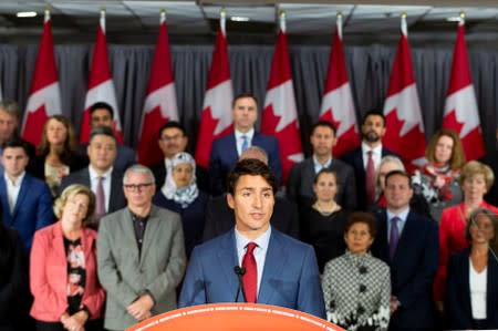 FILE PHOTO - Canada's PM Trudeau speaks during an election campaign stop in Toronto
