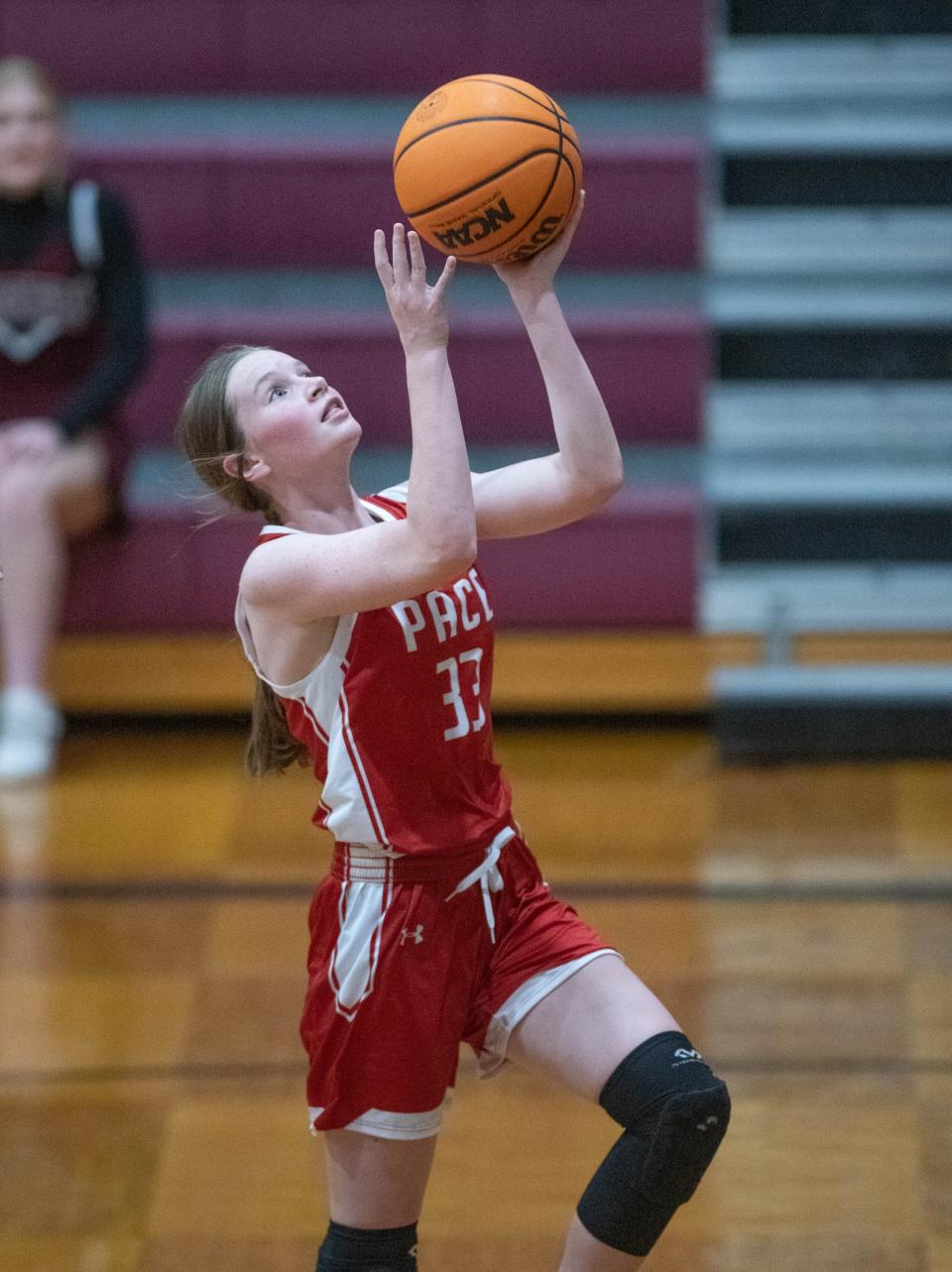 Grace Manor (33) takes it to the hoop during the Pace vs Navarre girls basketball game at Navarre High School on Thursday, Jan. 12, 2023.