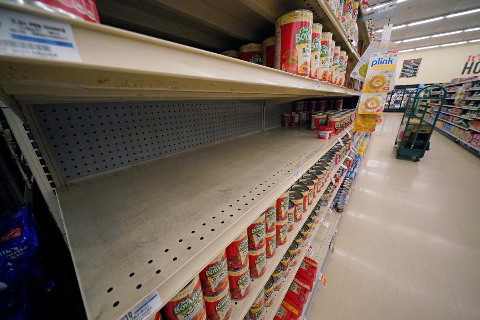 Shelves that held Chef Boyardee products are partially empty at a grocery in Pittsburgh, on Tuesday, Jan. 11, 2022. Shortages at U.S. grocery stores have grown in recent weeks as new problems like the fast-spreading omicron variant and severe weather have piled on to the supply chain struggles and labor shortages that have plagued retailers since the coronavirus pandemic began. (AP Photo/Gene J. Puskar)