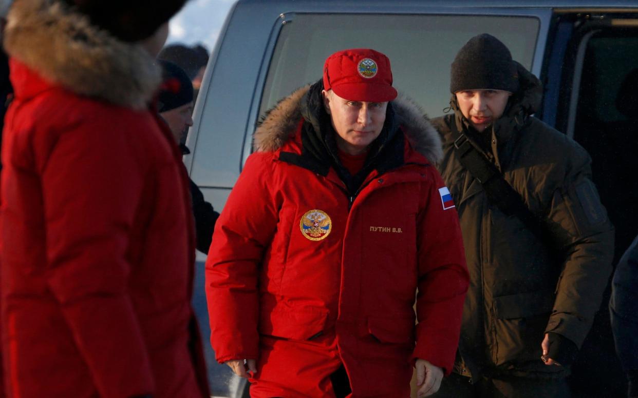 Vladimir Putin visits Alexandra Land in the remote Arctic islands of Franz Josef Land - REUTERS