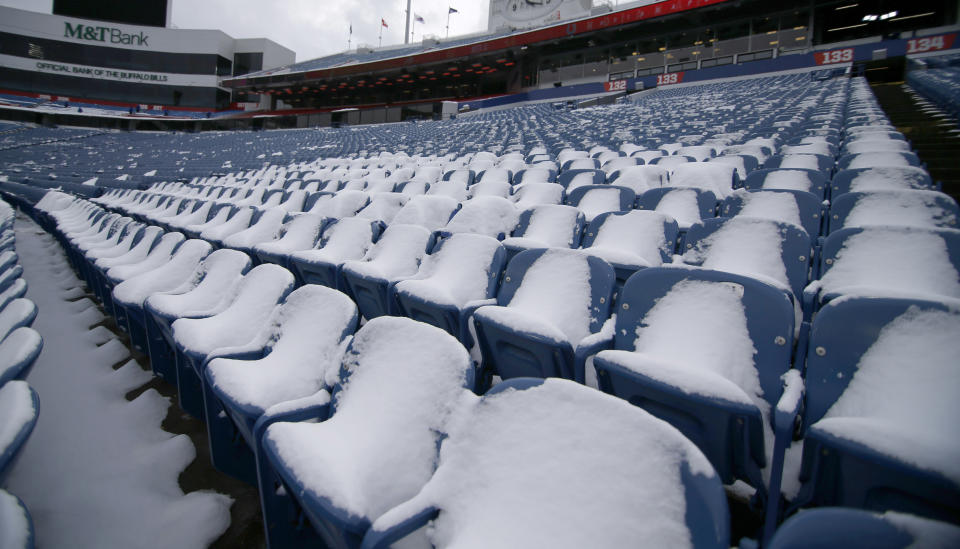 <p>A general view of snow covered seats at New Era Field before a game between the Buffalo Bills and the Indianapolis Colts. Mandatory Credit: Timothy T. Ludwig-USA TODAY Sports </p>