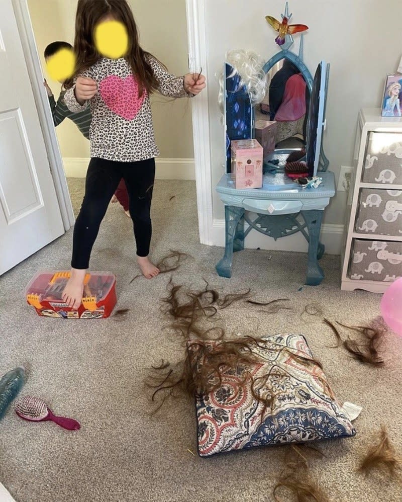 photo of kids with hair all over the floor