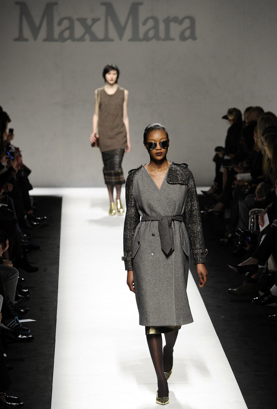 A model wears a creation for Max Mara women's Fall-Winter 2014-15 collection, part of the Milan Fashion Week, unveiled in Milan, Italy, Thursday, Feb. 20, 2014. (AP Photo/Giuseppe Aresu)