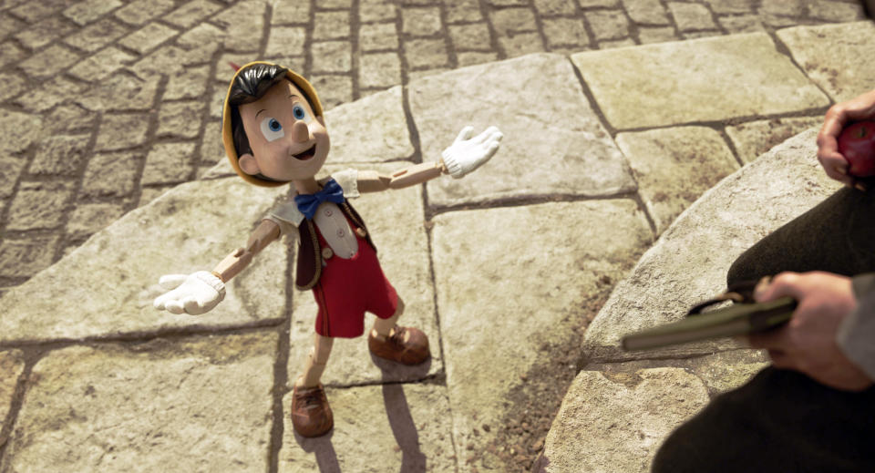 This image released by Disney shows Pinocchio, voiced by Benjamin Evan Ainsworth, in Disney's live-action film "Pinocchio." (Disney via AP)