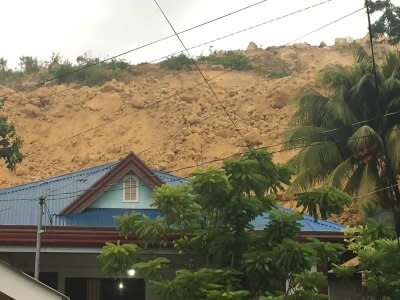 Erosion on the side of a hill is seen after a landslide in Cebu, Philippines, September 20, 2018, in this picture obtained from social media. VHANN QUISIDO/via REUTERS